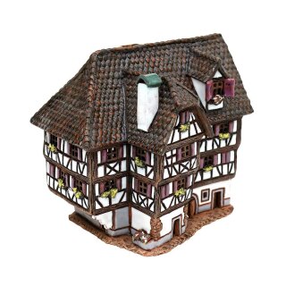 \La Maison de parfum à la lumière de céramique (en cheminée) de lHôtel Obernai en Alsace\