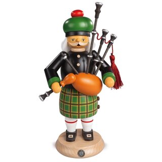 Smoking man - Scotsman in highland costume with bagpipes