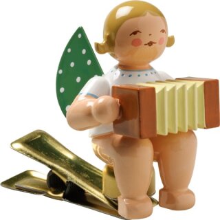 Angel with harmonica, on clamp