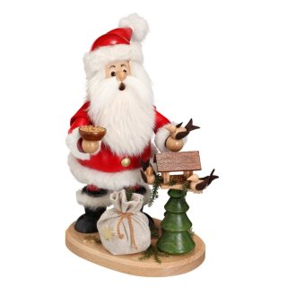 \Le Père Noël avec sa maisonnette à oiseaux : un cadeau de Noël original et charmant\