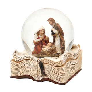 Snow globe Holy Family on book