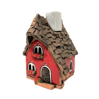 \La maison de fumée - rouge avec une cheminée blanche\