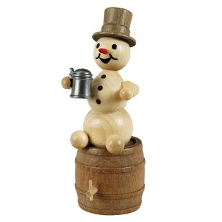 \Bonhomme de neige avec un cruchon sur un tonneau de bière\