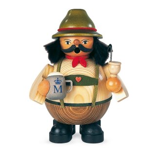 Smoking man - little Bavarian at the Oktoberfest